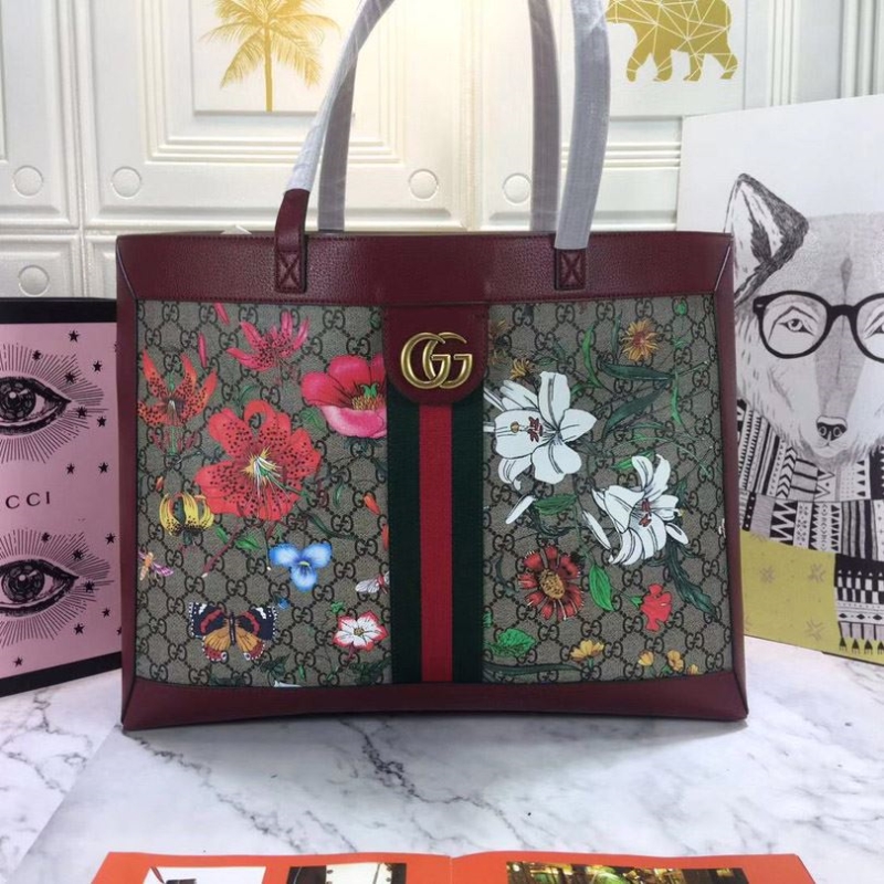 G*u*i shopping bags
